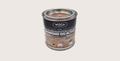 Oil container for the maintenance and protection of a wooden staircase